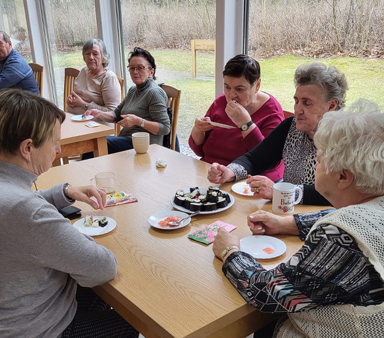 Elderly people eating