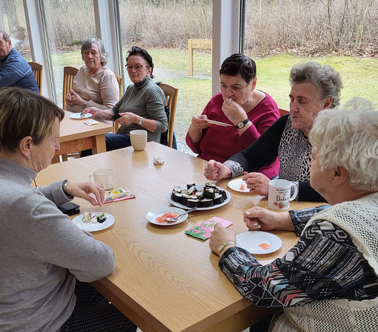 Elderly people eating