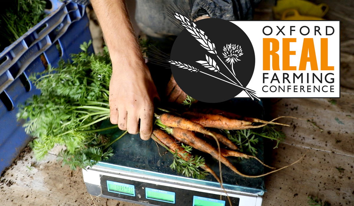 Oxford Real Farming Conference image with hands holding carrots and the conference logo