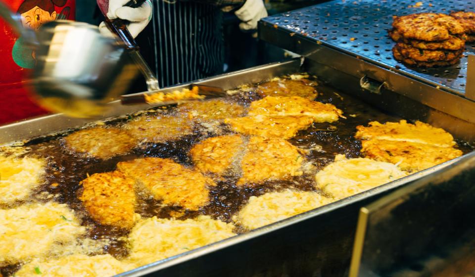 Hand preparing a fast food